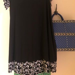 Black dress with beautiful embroidery.